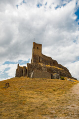 Obraz premium Explore the historic Atienza castle on a rocky hill in Guadalajara, Spain under a cloudy sky