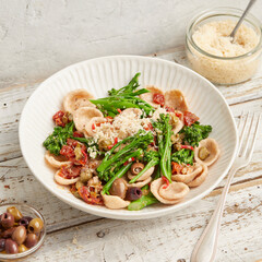 Orecchiette with broccoli, tomato and capers
