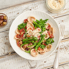 Orecchiette with broccoli, tomato and capers