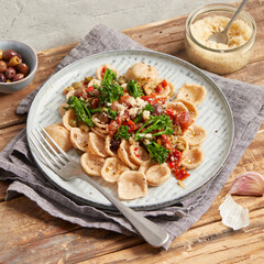 Orecchiette with broccoli, tomato and capers