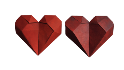 Two red polygon hearts against black background
