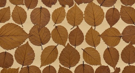 Obraz premium Brown Leaves Pattern on Beige Background Autumnal Texture.