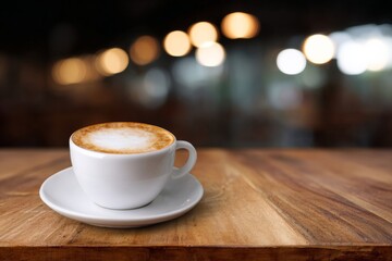 Fototapeta premium Cozy cappuccino cup on rustic table, reminiscent of Hygge mornings and aromatic International Coffee Day celebrations