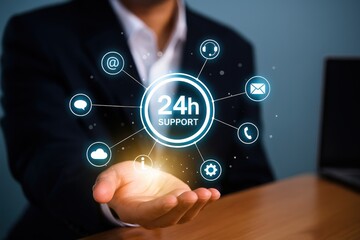 A hand holds a holographic display of 24-hour support services, complete with various communication icons.