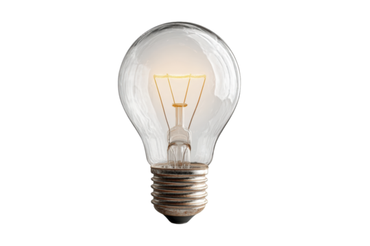 Illuminated lightbulb against black background