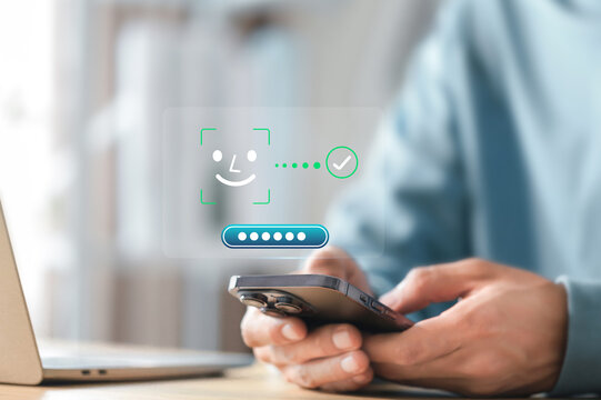 Secure login using facial recognition and password authentication , Businessman using smartphone and face recognition login , data protection, privacy, authentication, and online security.