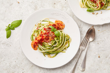 Raw zucchini with tomato sauce