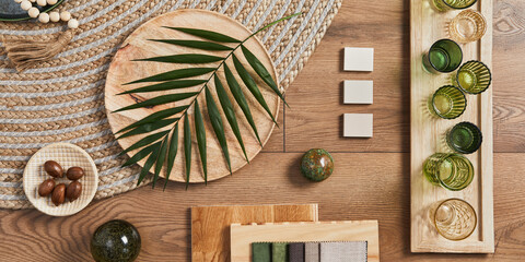 Flat lay of creative architect moodboard composition with samples of building, orange textile and...