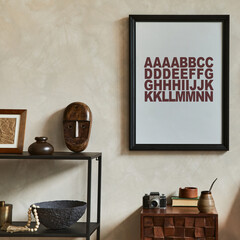 Creative composition of elegant masculine living room interior with mock up poster frame, brown armchair, industrial geometric shelf and personal accessories. Template.