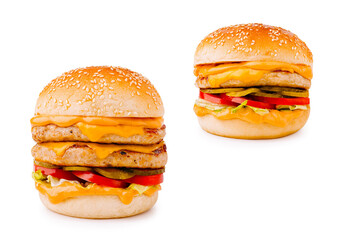 Delicious cheeseburgers with fresh ingredients on a clean background