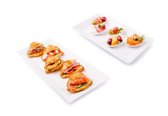 Delicious appetizers with croissants and fresh fruit served elegantly