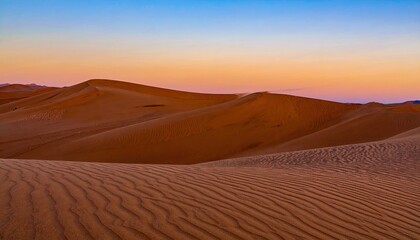 Fototapeta premium Rolling Sand Dunes at Sunset Under a Soft Gradient Sky