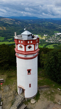 Observation ancient tower on the top of Mount Biskupia Kopa Opawskie Mountains, Poland. View from the top to the mountain valley of the Czech and Poland.