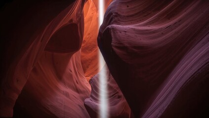 Dramatic sandstone formations illuminated by sunlight in a narrow canyon in Arizona