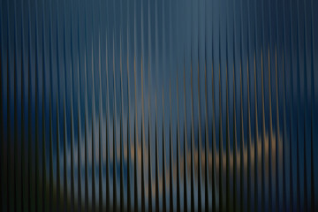 Abstract vertical lines creating a textured moody and atmospheric visual with hints of light