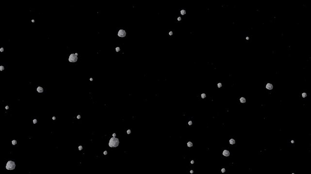  looping animation of a dense asteroid field drifting and rotating in the blackness of space.