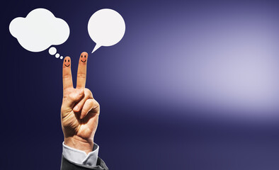 Hand with two fingers showing smiley faces and speech bubbles on gradient background, symbolizing communication and social interaction.