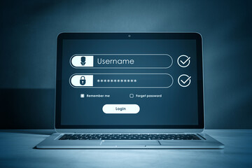 Login screen interface on laptop showing username and password fields with secure access icons and...