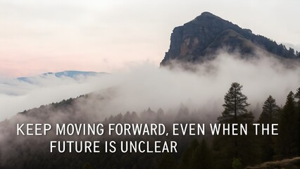 Motivational Quote on a Misty Mountain Landscape Background.