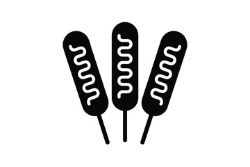 Three corn dogs with ketchup drizzle icon