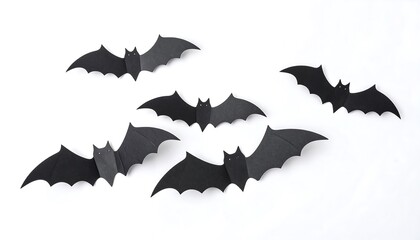 Black paper bats on white background