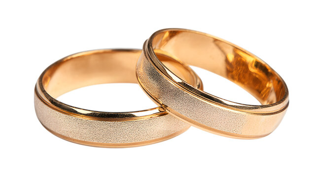 Elegant gold wedding rings symbolize enduring love and commitment for a lifetime together isolated on white background