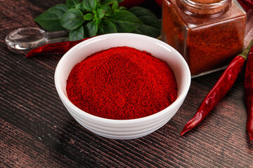 Spicy dry paprika powder in the bowl