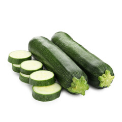 Whole and cut fresh zucchinis isolated on white