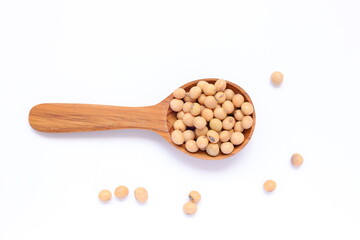 wooden spoon with beans, soy beans seeds in spoon 