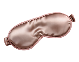 Angled side view of silk sleep eye mask with 3D contours, isolated on a transparent background, PNG