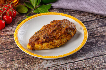 Baked chicken breast with spices and herbs
