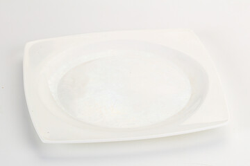 White ceramic empty plate dishware