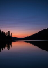Fototapeta premium Serene twilight lake reflection