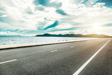 Empty road at angkol beach with beautiful mountain