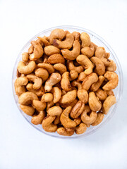 Roasted cashew nuts isolated on white background. Clipping path.
