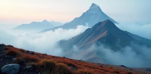 A lone peak, shrouded in mist, stands sentinel over a vast, untouched landscape The ultimate in remote, breathtaking serenity Silence reigns supreme , remote, powerful, awe-inspiring
