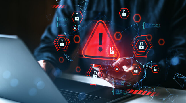 Cybersecurity breach warning with red alert symbol and open padlocks over digital interface and person using laptop, concept of data protection failure.