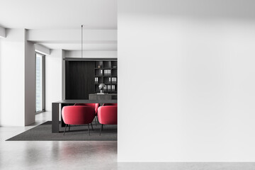 Modern office interior with red chairs, dark shelving and table, next to a blank white wall mockup for design presentation or branding concept. 3D Rendering