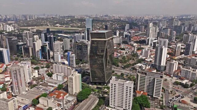 Vila Madalena Drone Orbit &ndash; Mirrored Building and Cityscape Over Largo da Batata, Sao Paulo