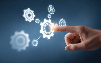 Hand touching glowing gear icons representing business process and technology.