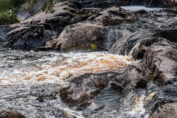 Obraz premium Akhinkoski Waterfalls or Ruskeala Waterfalls on the Tohmajoki River. Russia, Republic of Karelia
