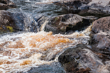 Akhinkoski Waterfalls or Ruskeala Waterfalls on the Tohmajoki River. Russia, Republic of Karelia