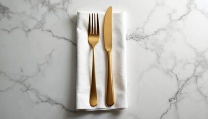 Elegant gold cutlery, fork and knife, arranged on white napkin atop marble table. Sophisticated place setting for fine dining experience, event, or celebration. Modern clean design.