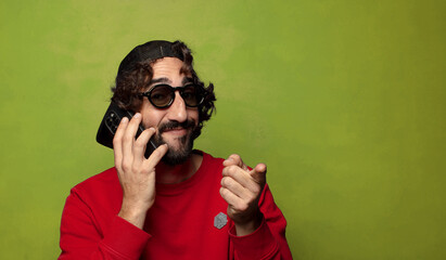 young adult bearded man with a smart phone