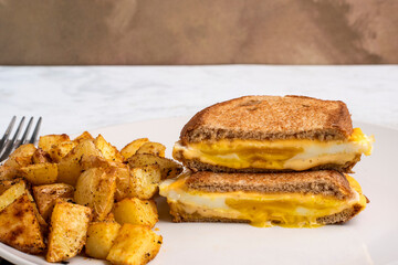 egg melt sandwich  with house fries