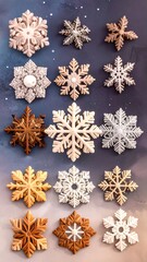 A collection of decorative snowflakes in various warm and cool tones arranged on a muted background.