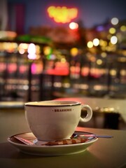 cup of coffee on the table at night