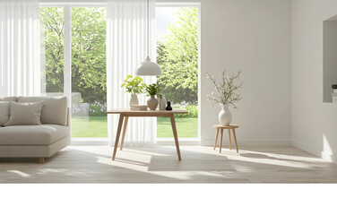 Bright and airy living room with modern furniture and a view of lush greenery and trees