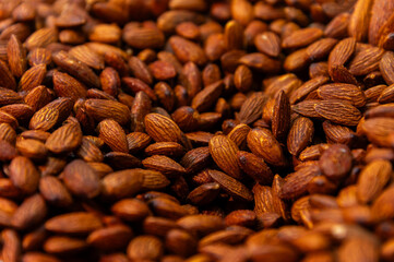 Spicy almonds. Aromatic roasted almonds. Crunchy almonds. Spicy nuts. Lots of roasted almonds with a BBQ and paprika flavor.