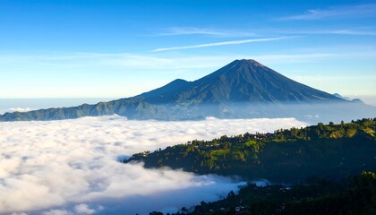 Fototapeta premium Volcanic mountain peak above clouds